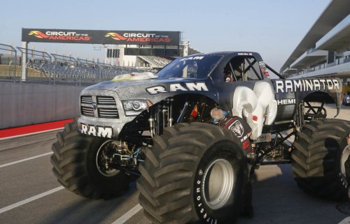 RAMINATOR driver Mark Hall prepares to attempt setting a new GUINNESS WORLD RECORDS  record for Fastest Speed for a Monster Truck at Circuit of the Americas Speedway, on Monday, Dec. 15, 2014 in Austin, Texas. Hall reached a speed of 99.1 mph to break the 2012 record of 96.8 mph. (Photo by Jack Plunkett/Invision for Ram Truck brand, Chrysler Fiat Automobiles/AP Images)