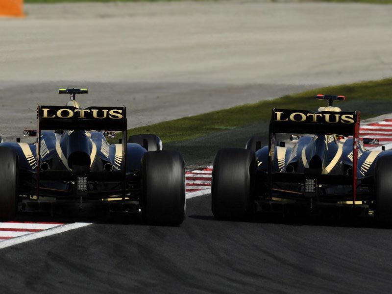 Kimi Raikkonen and Romain Grosjean from Lotus